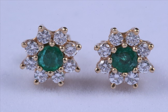 Appraisal: PAIR K YELLOW GOLD EMERALD AND DIAMOND STUD EARRINGS Each