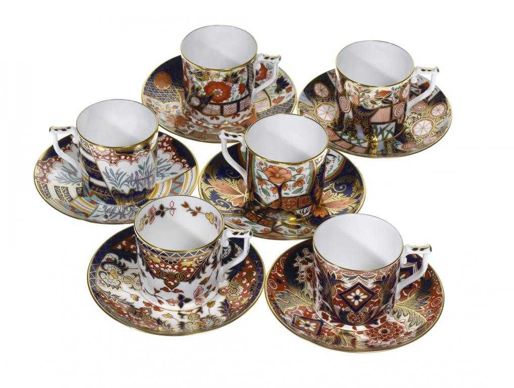 Appraisal: A HARLEQUIN SET OF SIX ROYAL CROWN DERBY COFFEE CANS