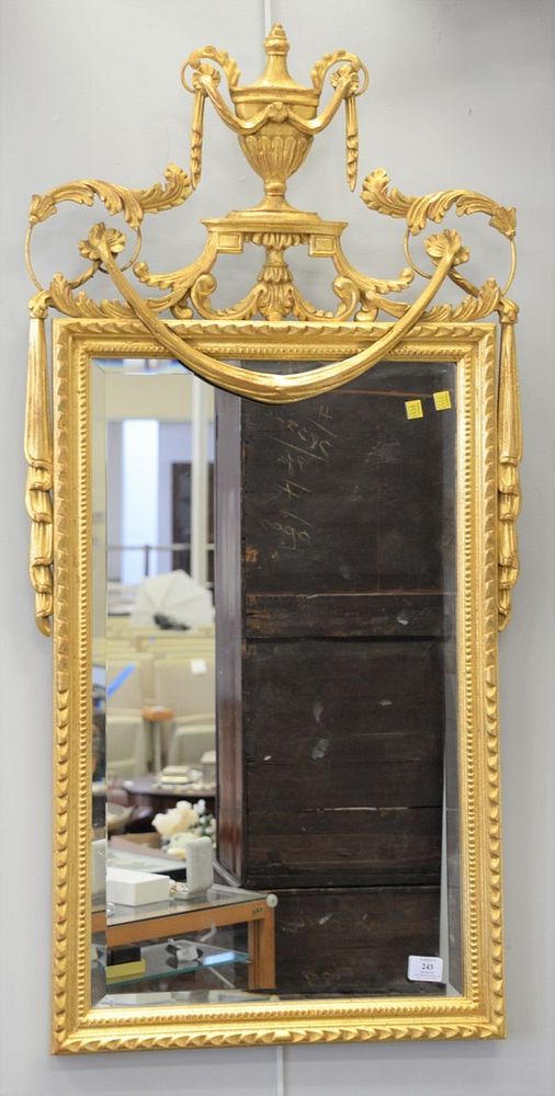 Appraisal: La Barge gilt mirror with carved pediment having urn foliate