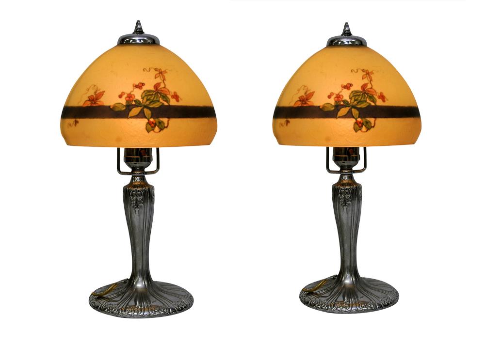 Appraisal: PAIR OF HANDEL HOLLY BERRY SILVERED BOUDOIR LAMPScirca reverse painted