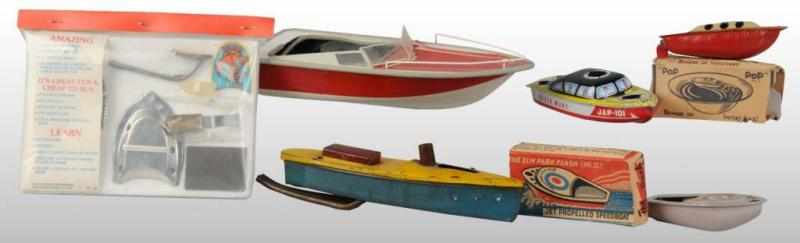 Appraisal: Lot of Pop-Pop Boats Description Including the desirable blue and