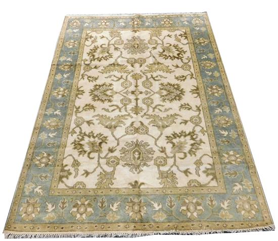 Appraisal: RUG Oushak carpet sultanabad design with cream field celadon green