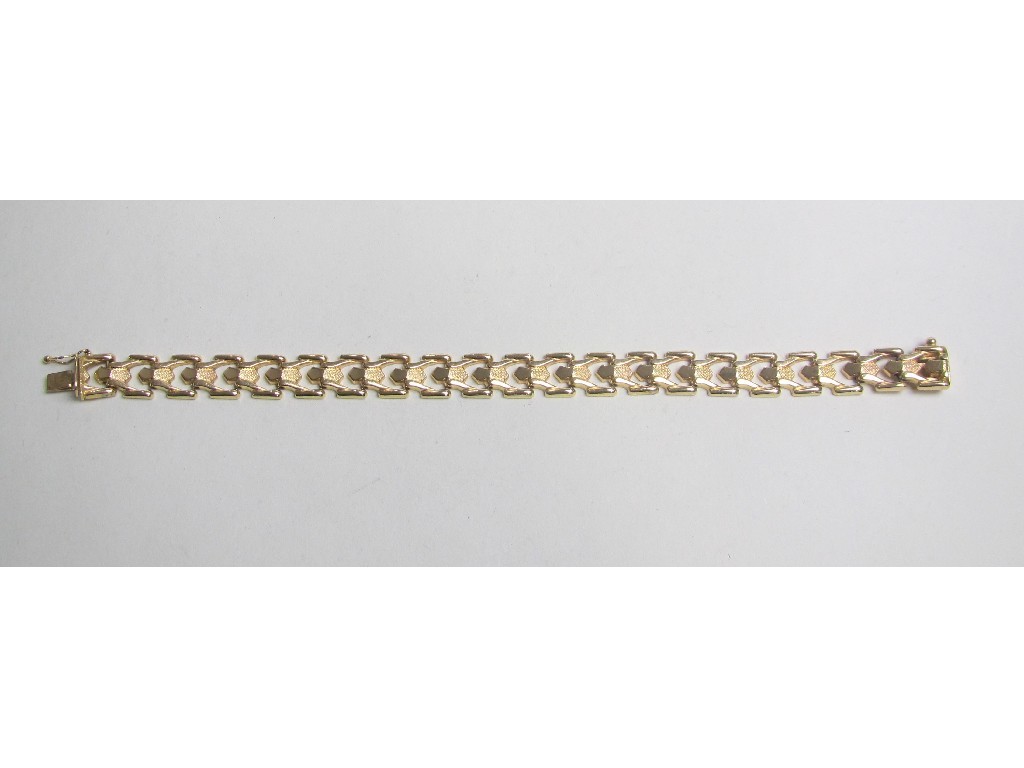 Appraisal: Eighteen carat gold fancy link bracelet Approximately gms