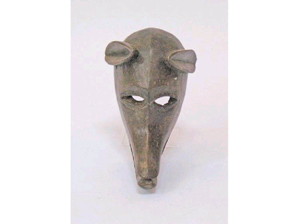 Appraisal: A CARVED AFRICAN MASK of an antelope's head with pointed