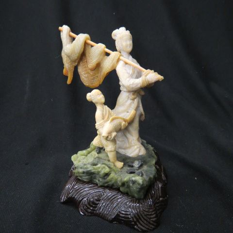 Appraisal: Chinese Carved Jade Hardstone Figurinefisherman child with net catch plus