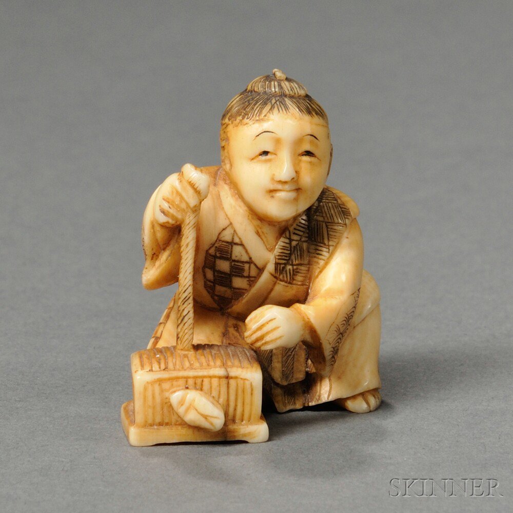 Appraisal: Ivory Netsuke Japan th century seated figure holding a box