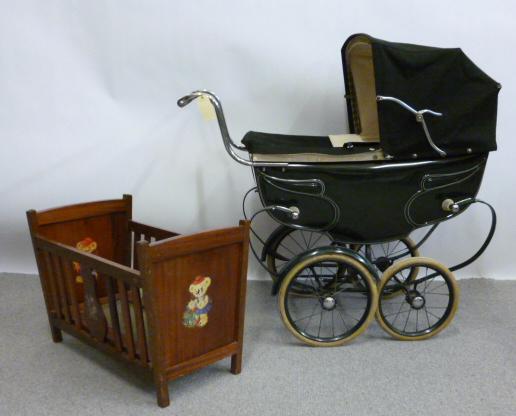 Appraisal: A Silver Cross doll's pram early mid th century green