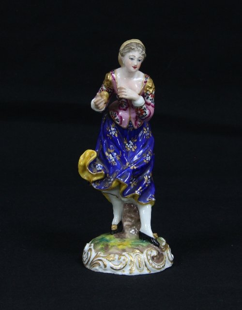 Appraisal: A Sampson porcelain figure of a girl wearing a pink