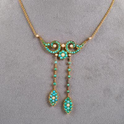 Appraisal: EDWARDIAN TURQUOISE AND SEED PEARL NEGLIGEE Scroll and florette suspend