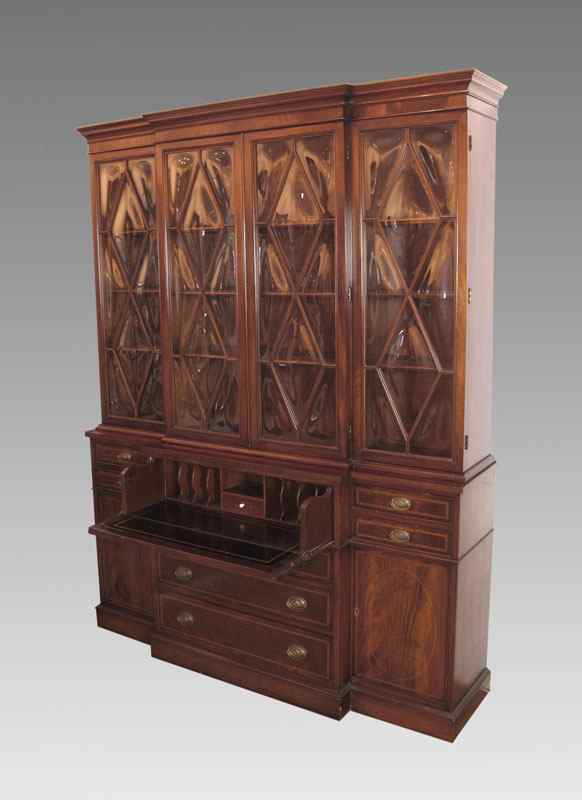 Appraisal: JOHN STUART MAHOGANY BREAKFRONT CHINA CABINET BOOKCASE bubble glass door