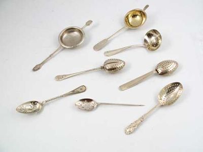 Appraisal: A small quantity or pierced strainer spoons a modern tea