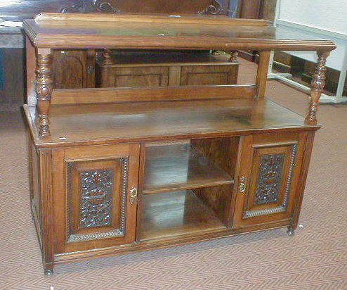 Appraisal: A late Victorian carved walnut buffet