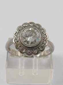 Appraisal: A platinum and diamond ring the centre stone measuring approx