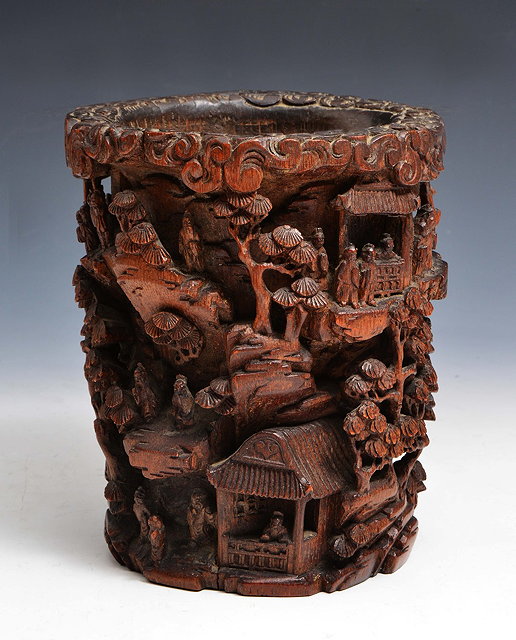 Appraisal: A CHINESE CARVED BAMBOO BRUSH POT deeply carved and undercut