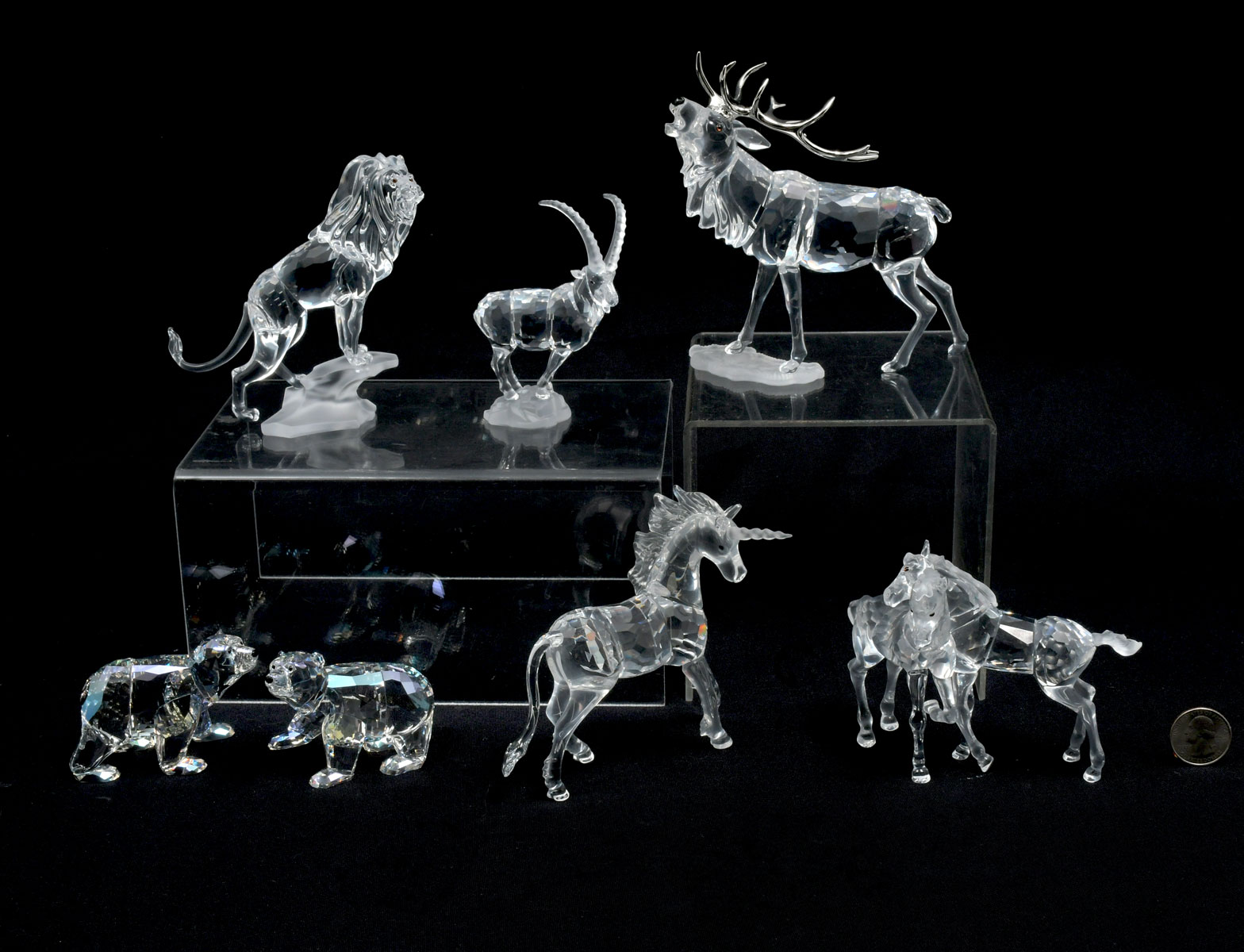 Appraisal: SWAROVSKI ANIMAL PIECES Horses Playing have clear faceted bodies with