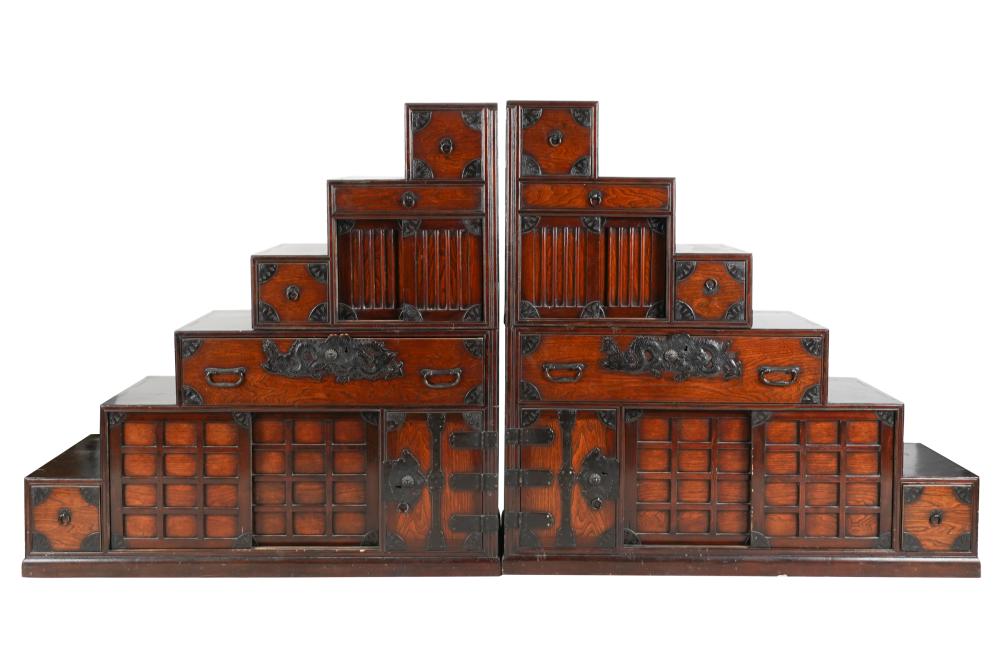 Appraisal: PAIR OF STEP TANSU CHESTSeach with five drawers two sliding