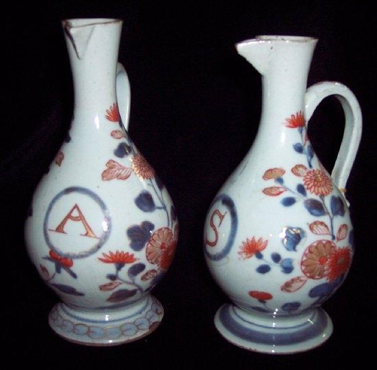 Appraisal: A pair of Imari jugs circa each with slender neck