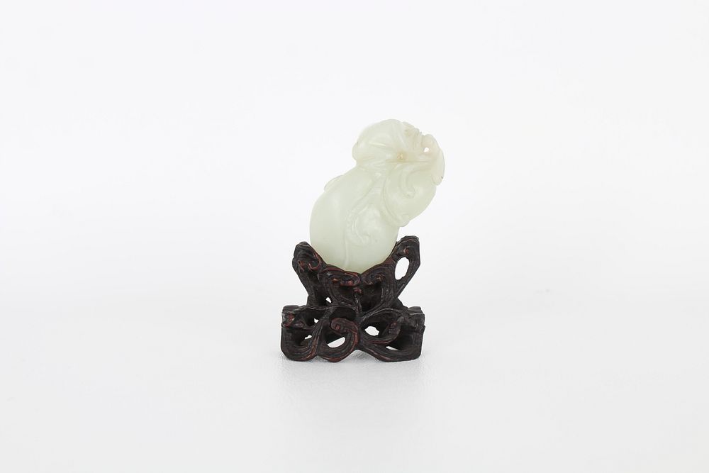 Appraisal: Chinese White Jade Group of Monkeys A Chinese white jade