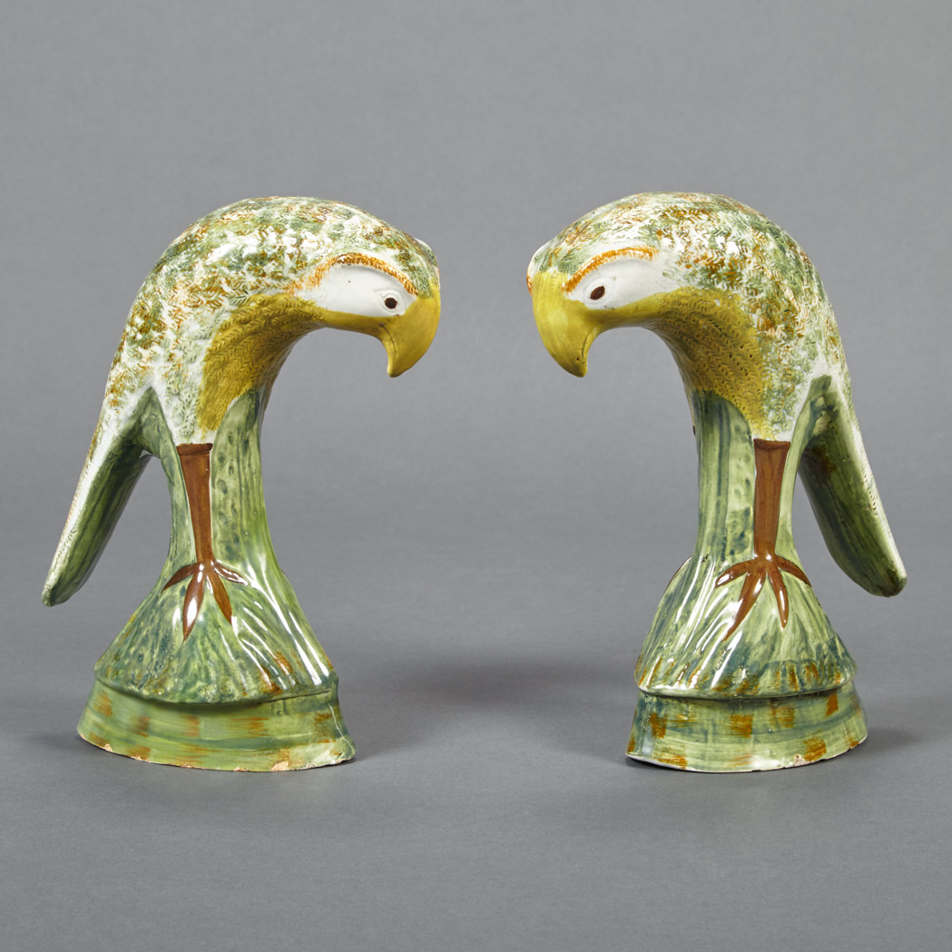 Appraisal: Pair of Staffordshire Type Pottery Figures of Parrots Mid th