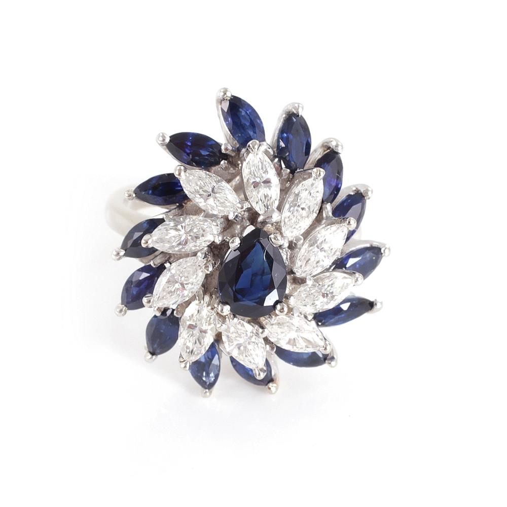 Appraisal: Sapphire and diamond cocktail ring x mm pear-shape dark blue