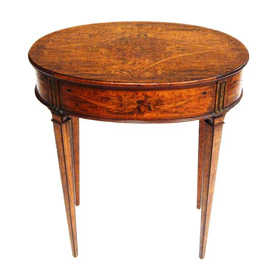 Appraisal: Continental oval table with marquetry inlay elaborate ribbon and floral