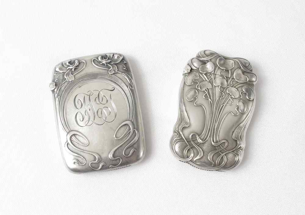 Appraisal: KERR ART NOUVEAU STERLING MATCH SAFES Both have art nouveau