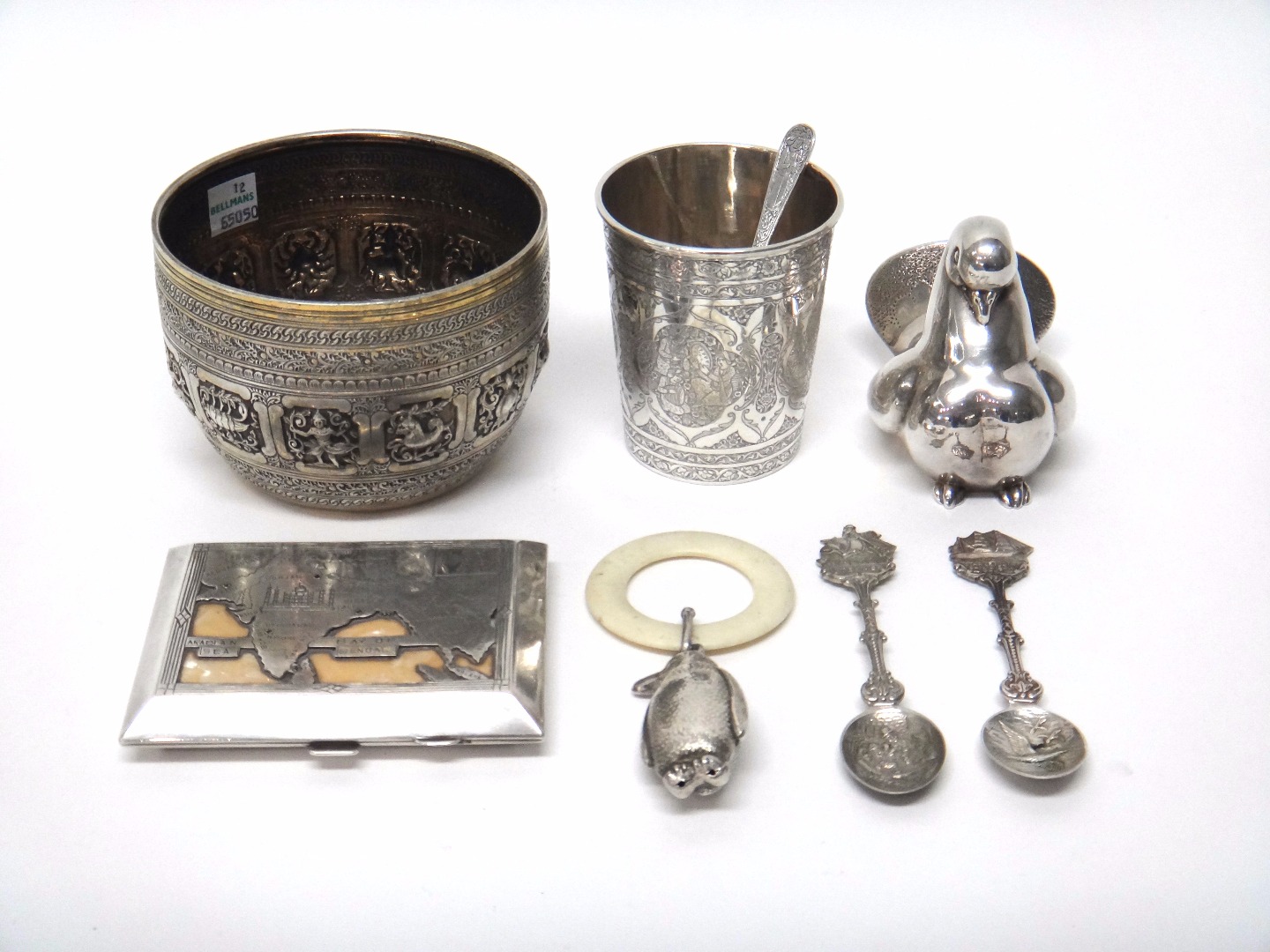 Appraisal: A Victorian silver sugar bowl having decorated panels in the