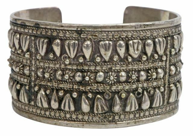 Appraisal: Silver content unknown cuff bracelet likely Egyptian with raised designs