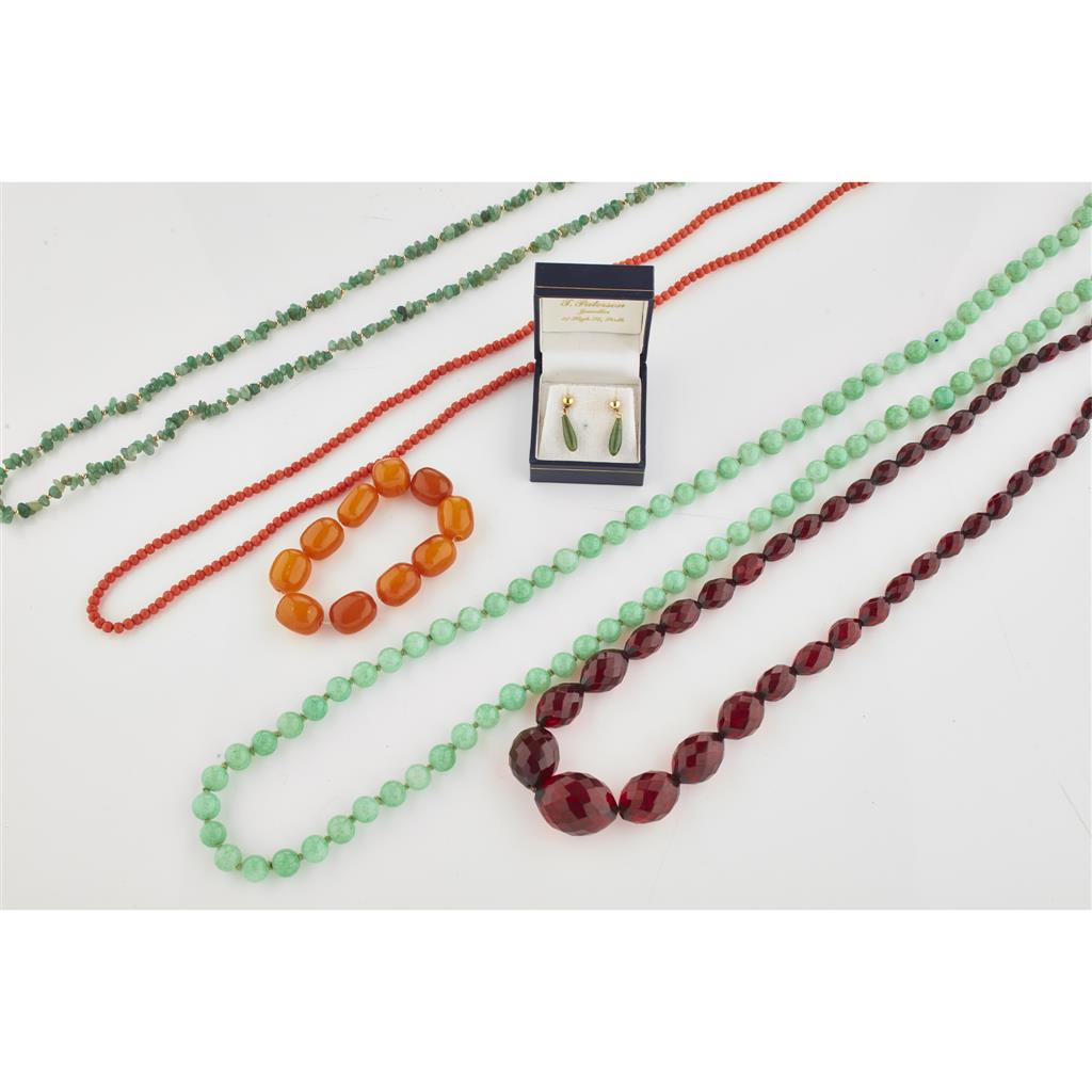 Appraisal: A collection of bead necklaces to include a single strand