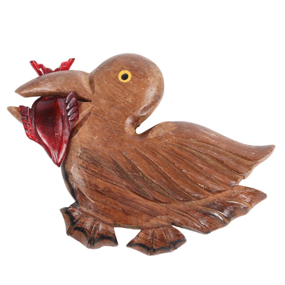 Appraisal: CARVED WOOD AND BAKELITE FIGURAL PELICAN WITH FISH IN MOUNT