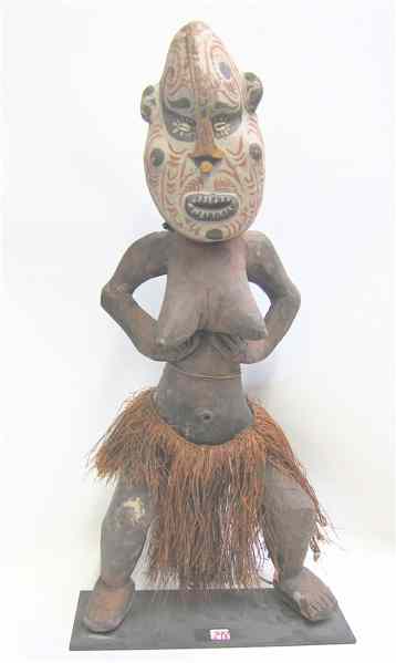 Appraisal: AN AFRICAN CARVED WOOD FEMALE FERTILITY FIGURE Hands at waist