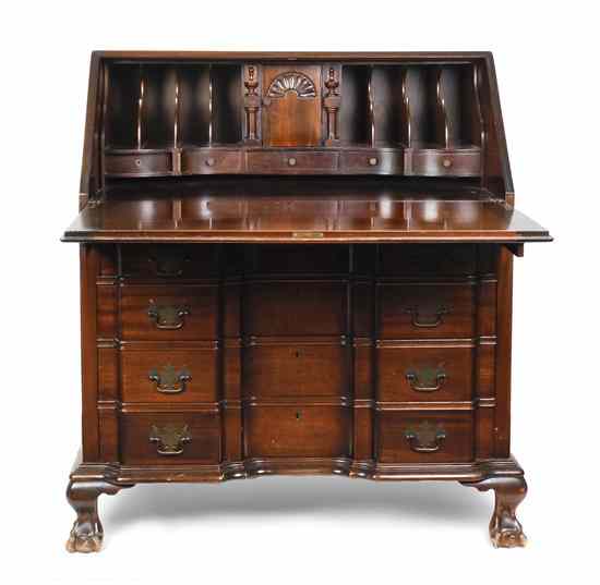 Appraisal: A Chippendale Style Mahogany Slant-Front Desk having interior portholes over