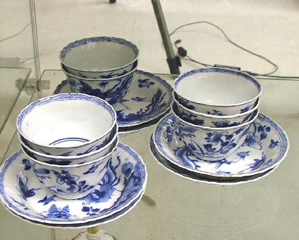 Appraisal: Set of eight blue and white tea bowls with six