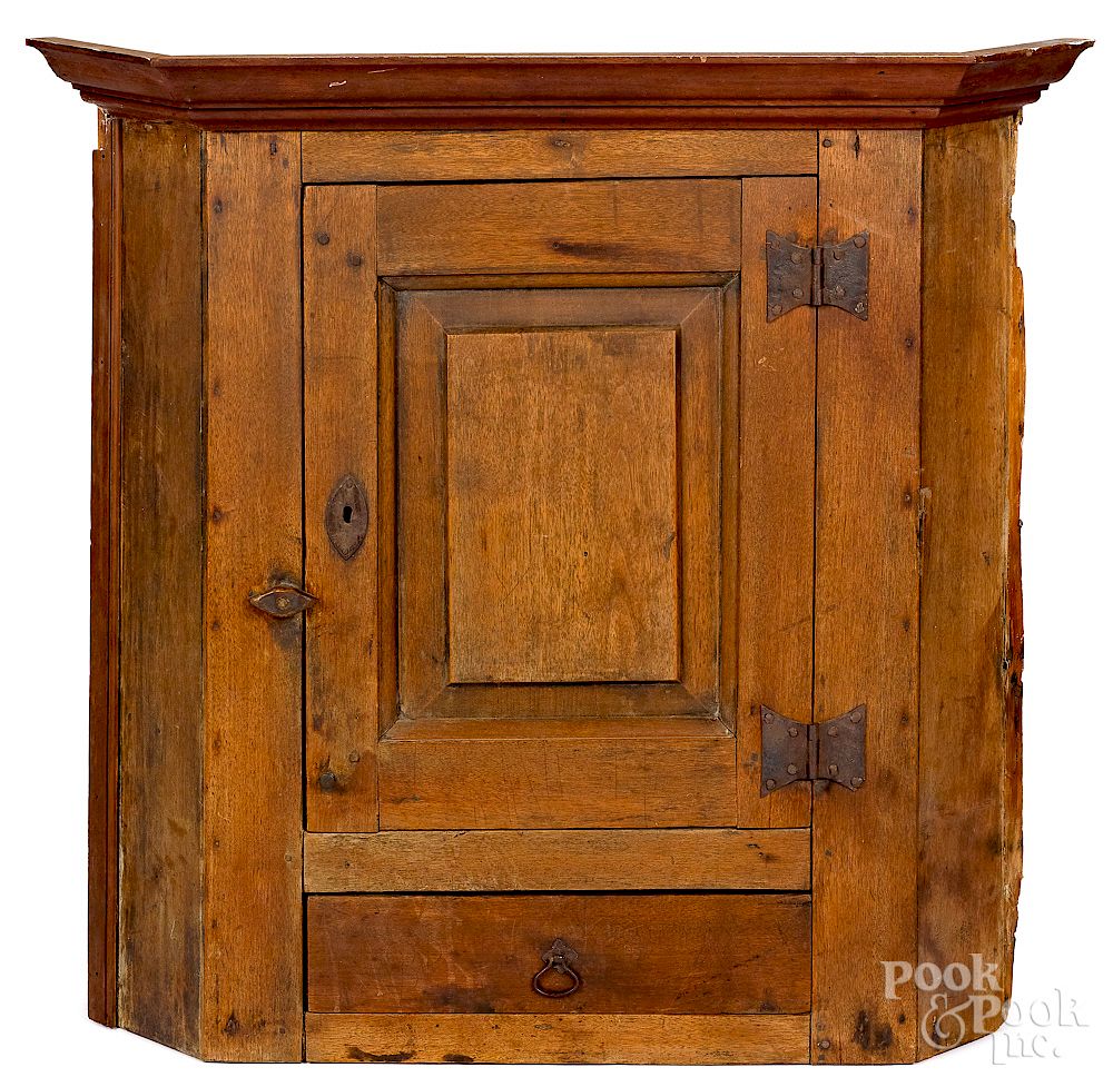 Appraisal: Pennsylvania walnut hanging corner cupboard Exclusive on Bidsquare Pennsylvania walnut