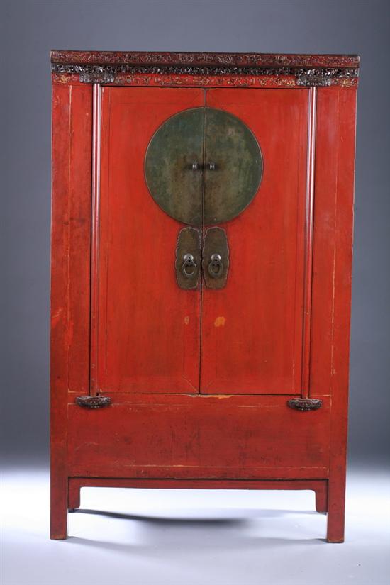 Appraisal: CHINESE RED LACQUERED FIR WOOD WEDDING CABINET Qing Dynasty circa