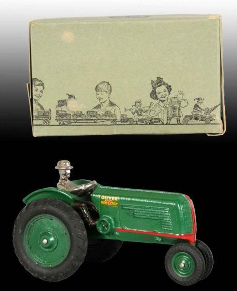 Appraisal: Cast Iron Arcade Row Crop Tractor Toy OB Description Includes