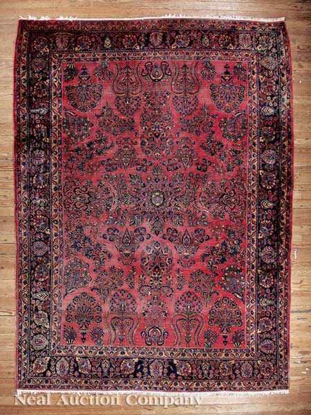 Appraisal: A Semi-Antique Persian Rug red and blue ground center field