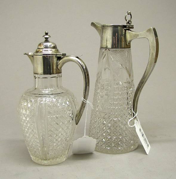 Appraisal: Two English silver mounted cut glass claret jugs Hallmarked Birmingham