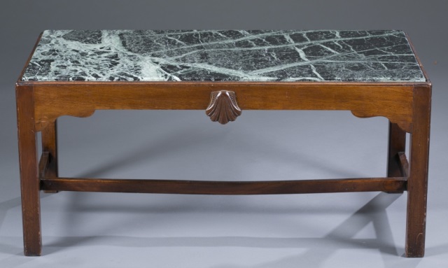 Appraisal: Granite-Top Coffee Table Mahogany Block-form base with carved shell center