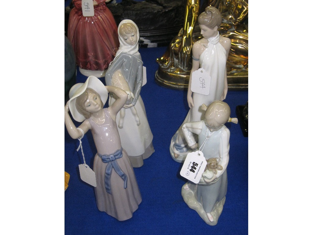 Appraisal: Two Lladro figures of women a Nao figure and one