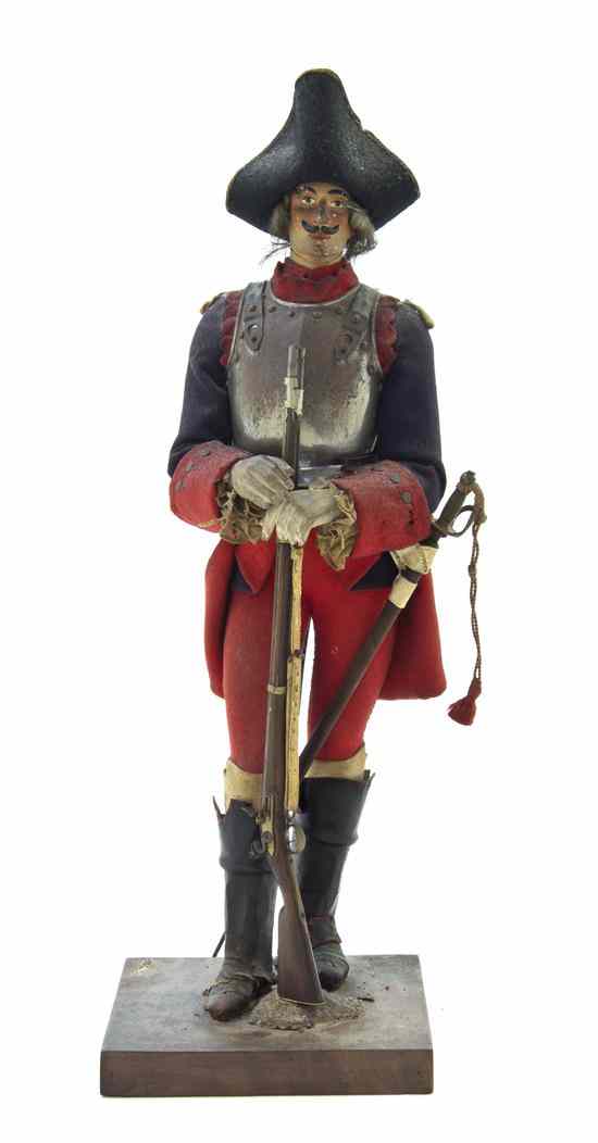 Appraisal: A French Carved Wood Military Figure Marcel Clesinger late th