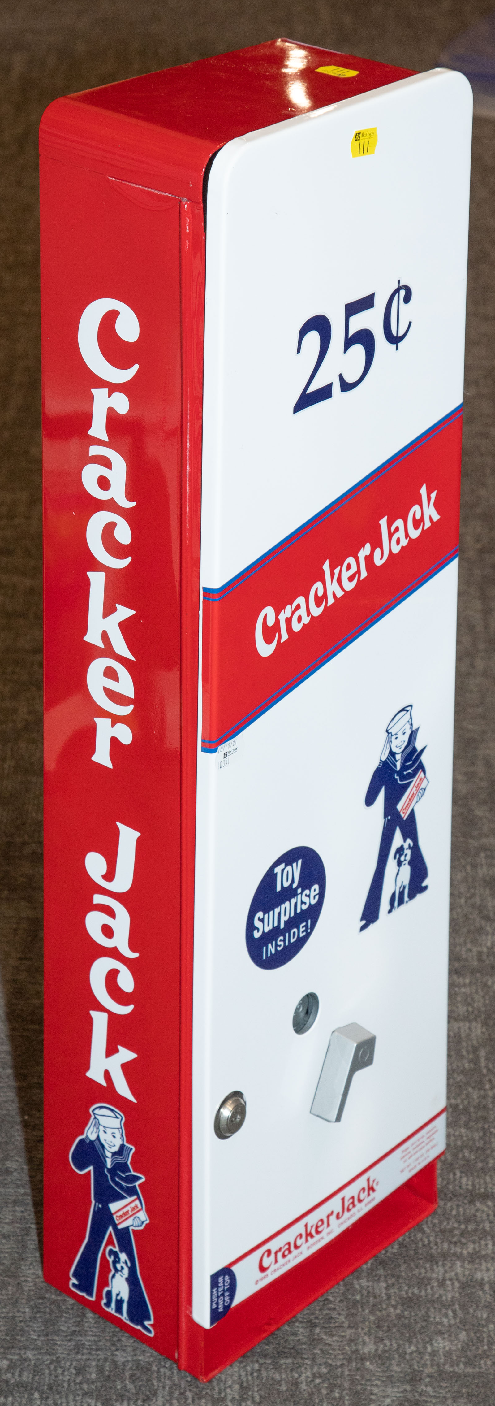 Appraisal: ENAMELED METAL CRACKER JACK VENDING MACHINE cent hanging machine in