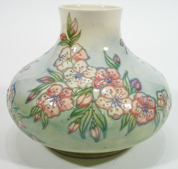 Appraisal: Moorcroft pottery vase hand painted and tubelined with Apple Blossom