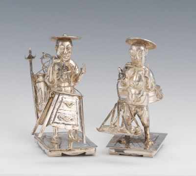 Appraisal: A Chinese Miniature Silver Figure Carrying Lobsters and a Man