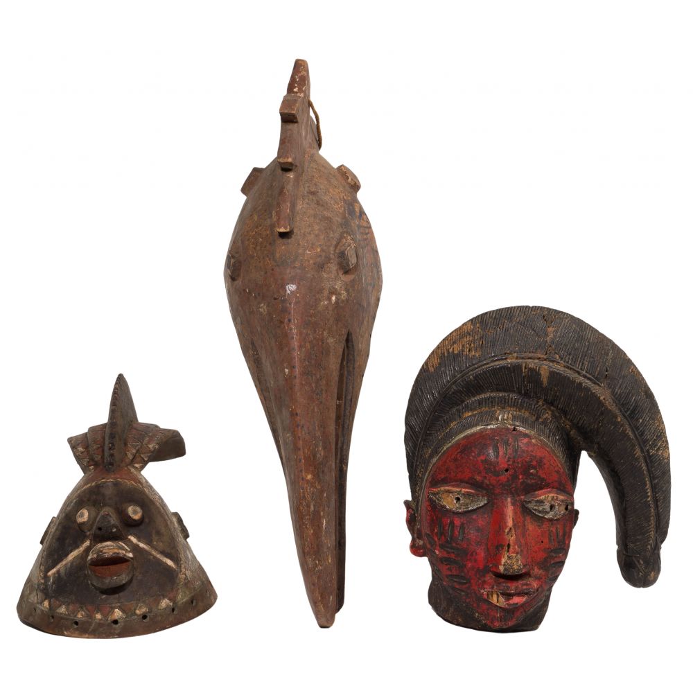 Appraisal: AFRICAN TRIBAL HEADDRESS ASSORTMENT items including a Dogon hornbill Senufo