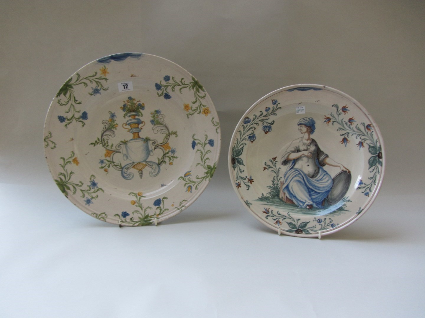 Appraisal: Two Pavia polychrome dishes early th century the first painted