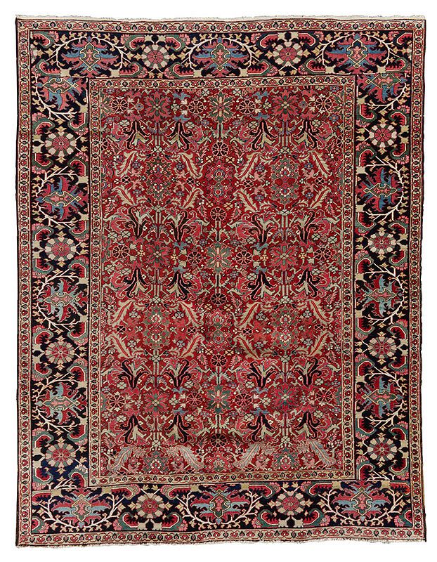 Appraisal: Heriz Carpet th century red field with leafy floral decorations