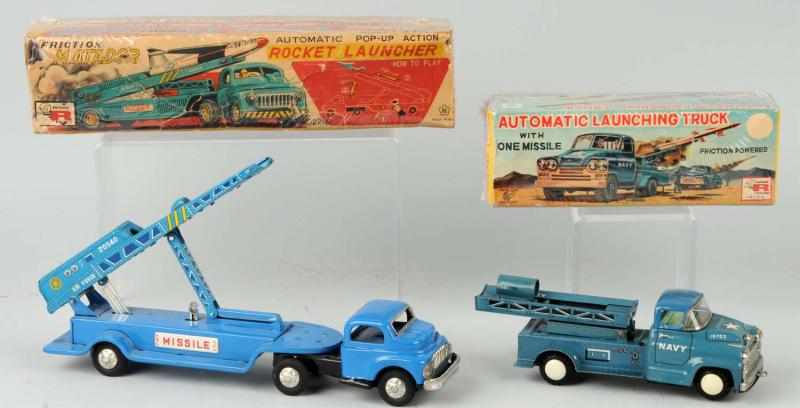 Appraisal: Lot of Rocket Launching Truck Friction Toys Description Japanese Working