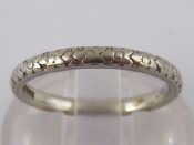 Appraisal: A vintage platinum ring with floral decoration size J gms