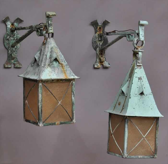 Appraisal: PAIR OF RENAISSANCE-STYLE LEAD WALL LANTERNS Each vertical back plate